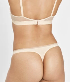 The No Show Thong: Toasted Almond -Outlet No Wire Bras Store 3 on model back no show thong toasted almond