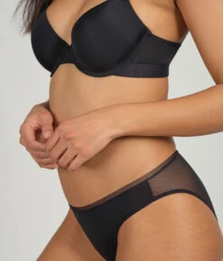 The T-Shirt Bra: Jet Black -Outlet No Wire Bras Store 3 on model side tshirt bra jet black