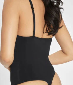 The Sleek Bodysuit: Jet Black -Outlet No Wire Bras Store 4 on model back sleek bodysuit jet black