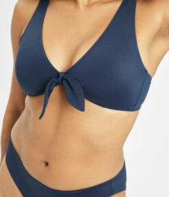 The Swim Plunge Bralette: Navy -Outlet No Wire Bras Store 4 on model front1 swim plunge bralette navy