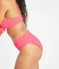 The Ruched Plunge Bralette & High Waist Swim Bundle: Electric Pink -Outlet No Wire Bras Store 5 on model side swim ruched bikini bottom electric pink
